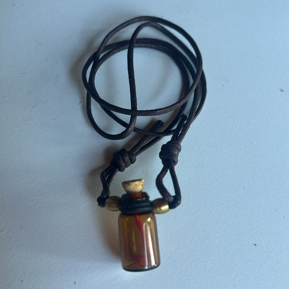 Tiny bottle necklace with red coral chips